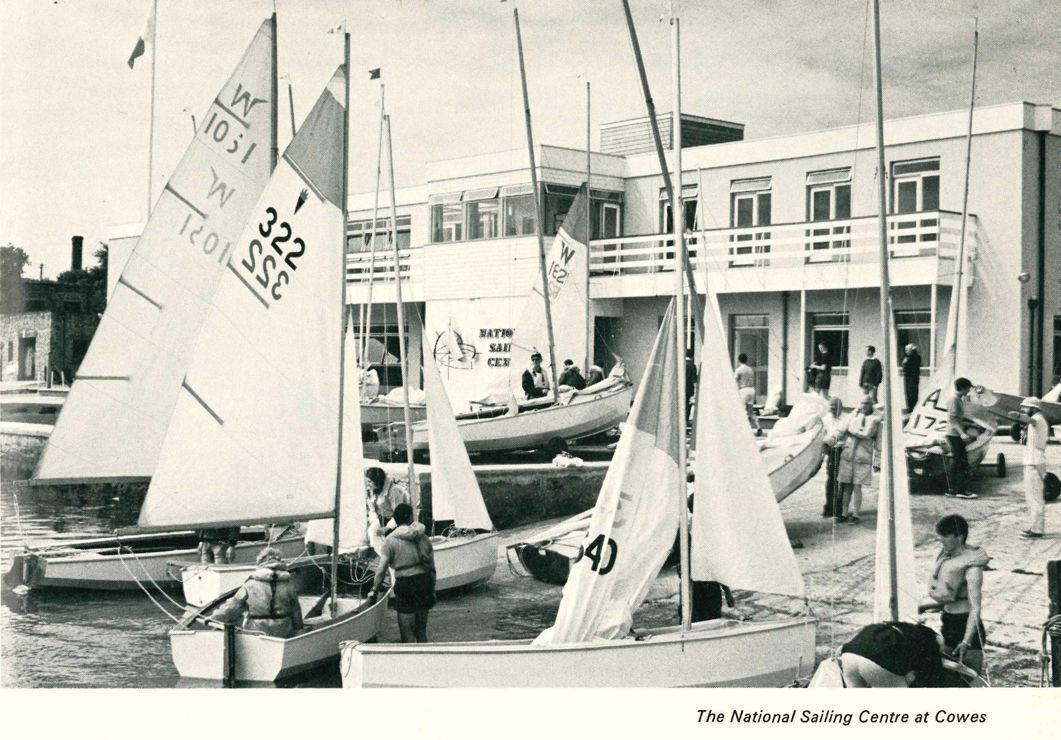 sailors preparing to set out on the water from their club 