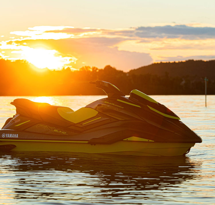 Personal watercraft (jet ski) in sunset waters