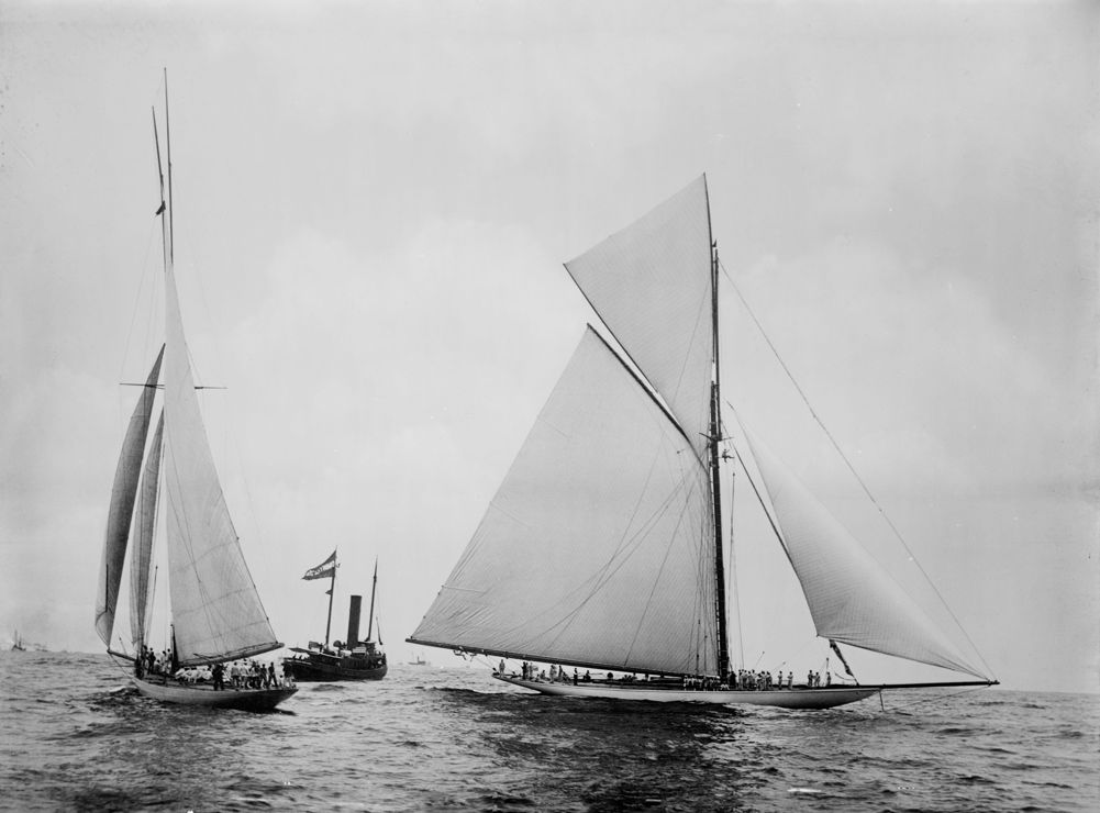 Black and white old image of traditional sailing yachts