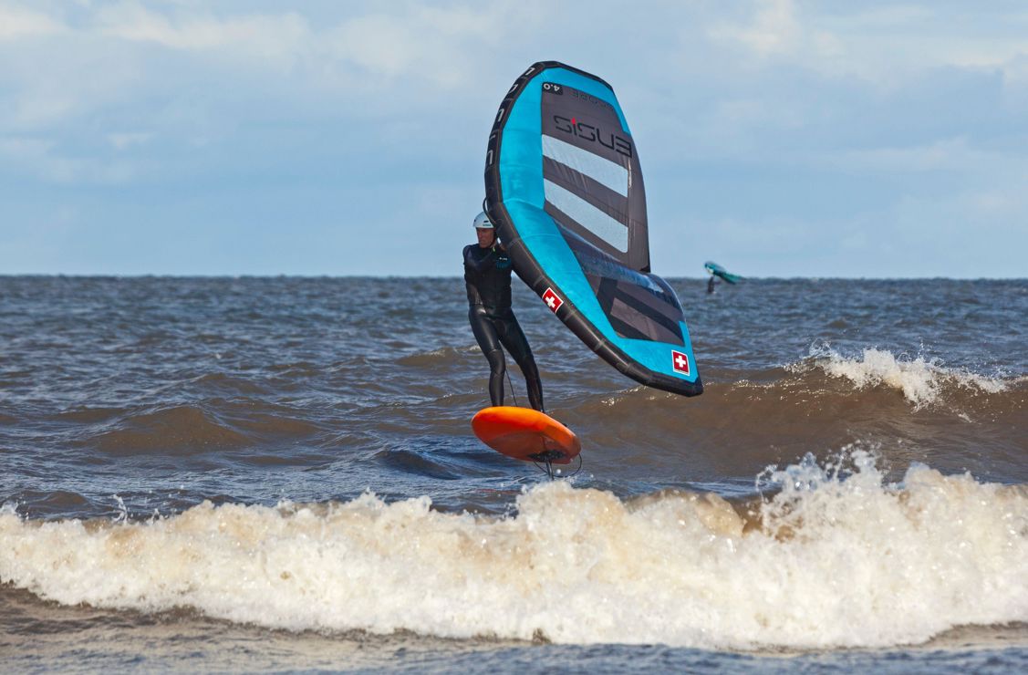 Shot of windsurfer travelling through the water