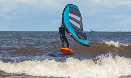 Shot of windsurfer travelling through the water