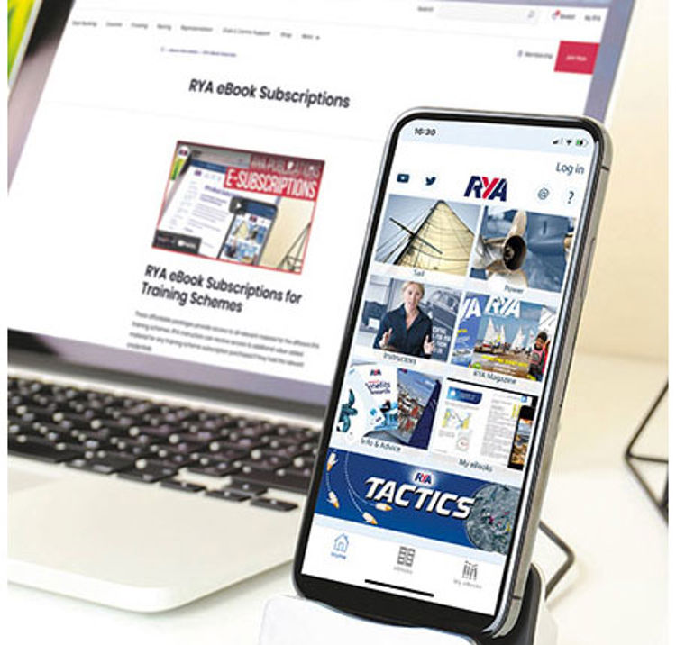 Laptop and Phone displaying the RYA website