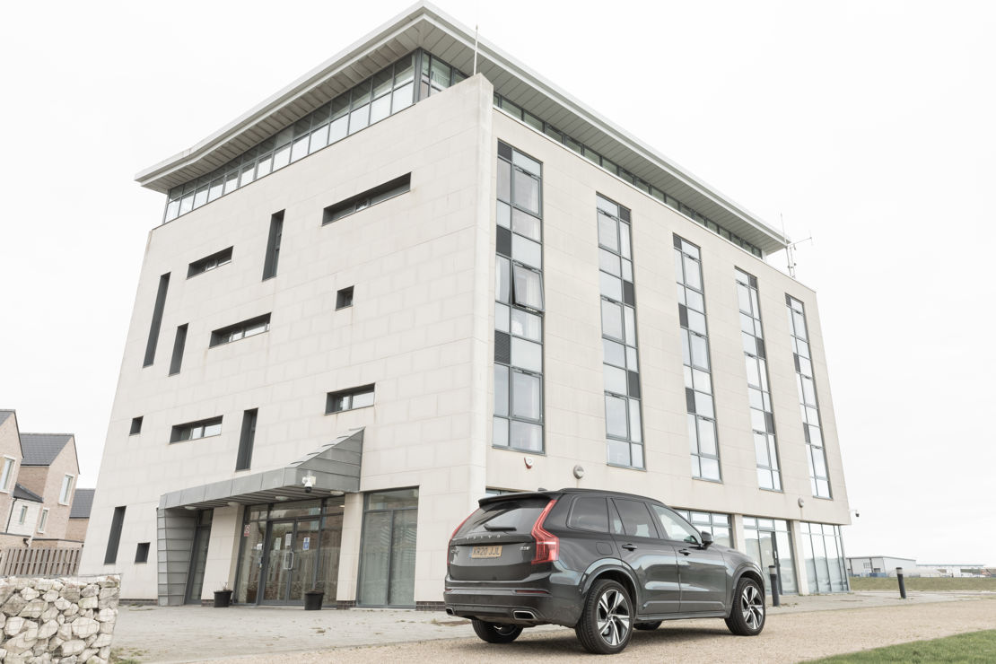 car parked outside hotel