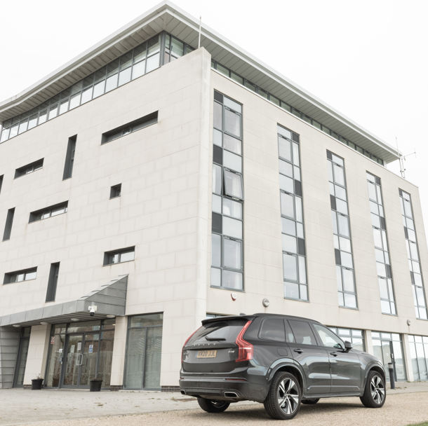 car parked outside hotel