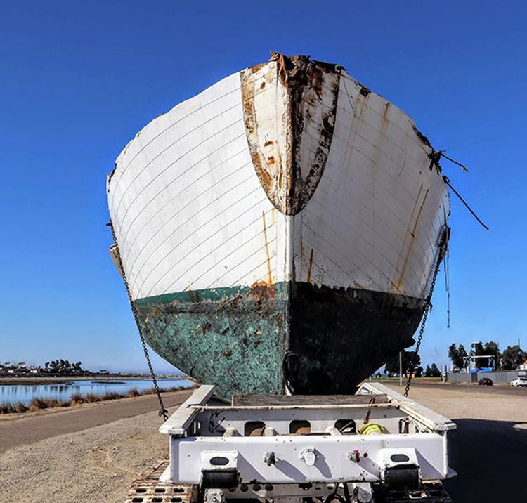 Abandoned Wrecked Ship Sitting On A Trailer