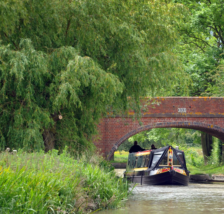 Canal Boat Under Bridge