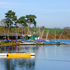 Boats anchored and moored outside sailing club