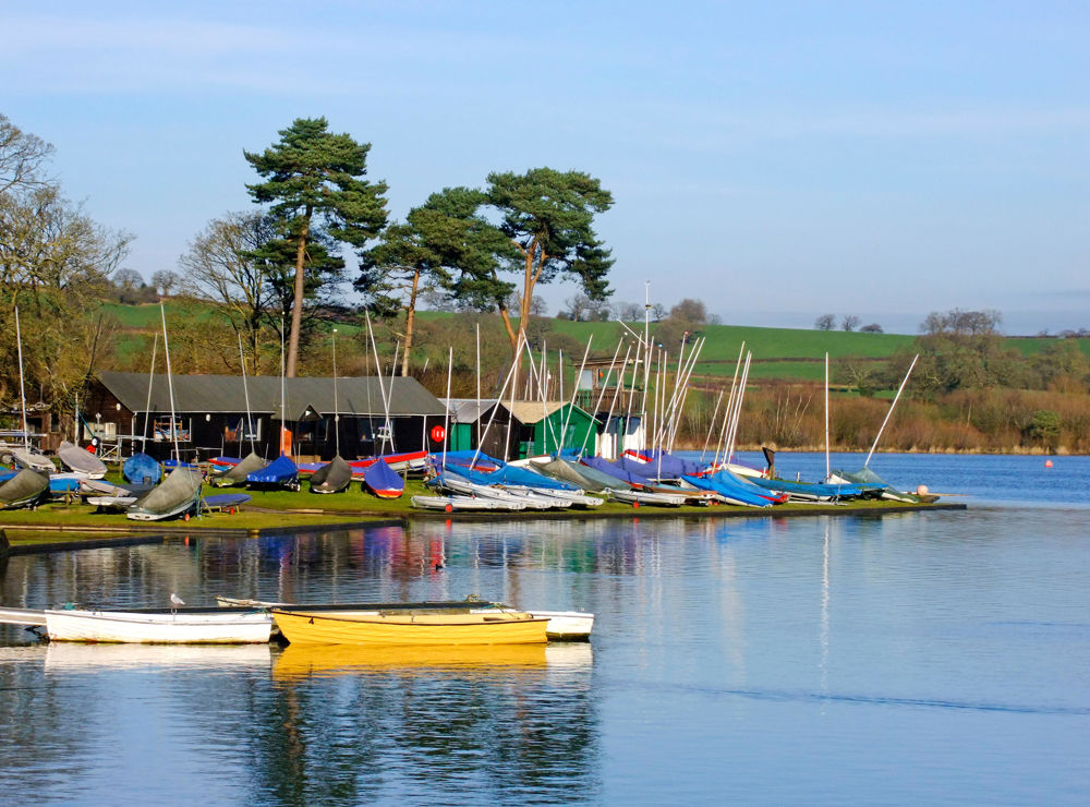 Boats anchored and moored outside sailing club