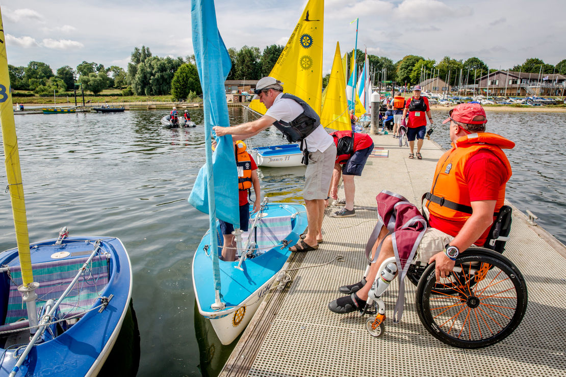 sailability sailing session, sailor in wheelchair approaching boat