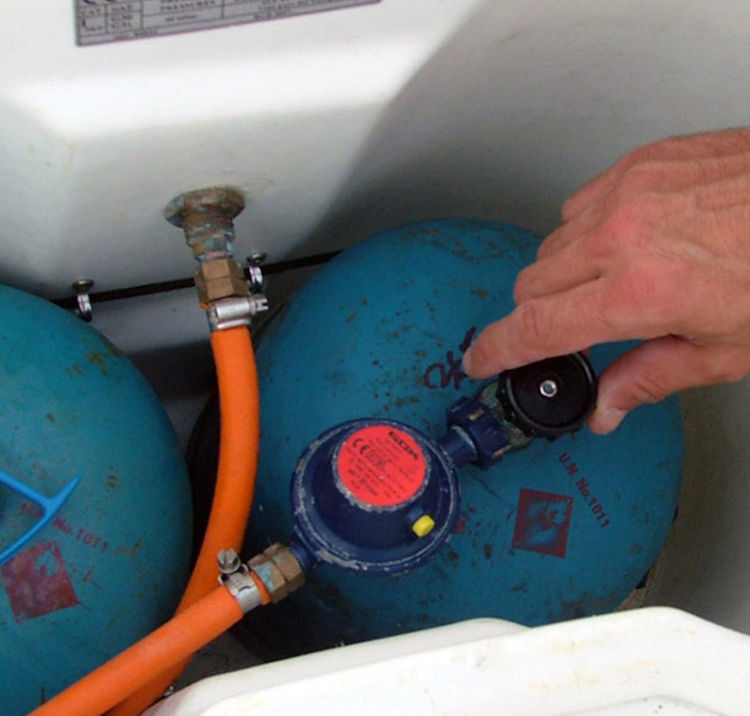 Shot of gas cannisters in a boat