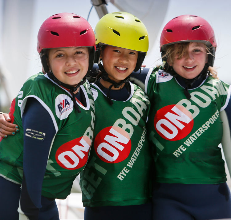 Three kids on a discover sailing day