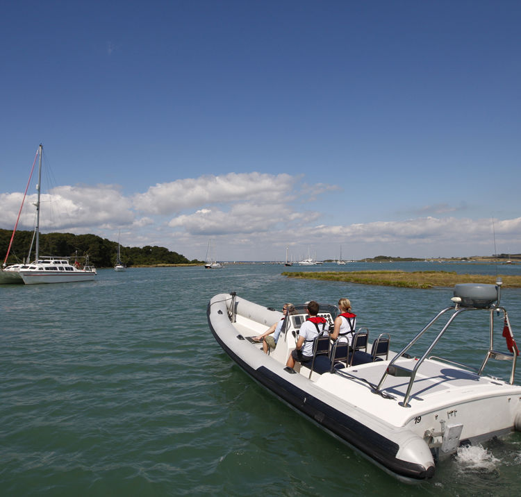 Powerboat travelling up river