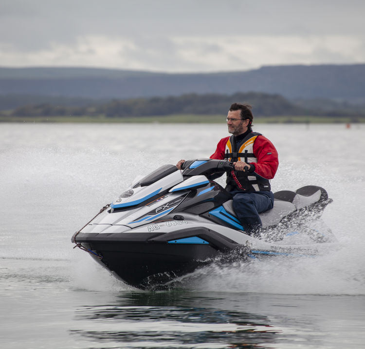 Personal watercraft (jet ski) rider on a winter day