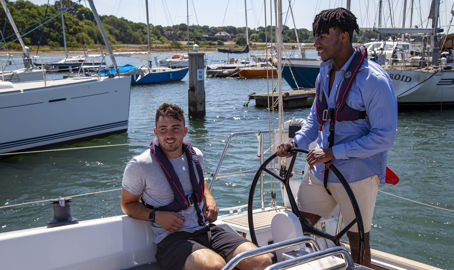 Two men on a boat in sunny weather