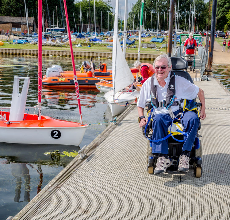 Sailor on the dock in his wheelchair