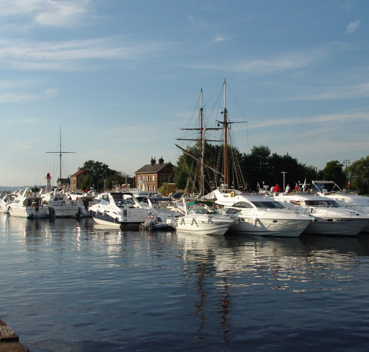 Motor Yachts On River Pontoon