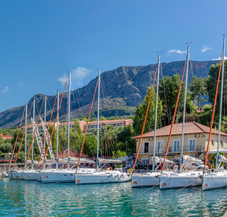 row of sailing yachts at a harbour 