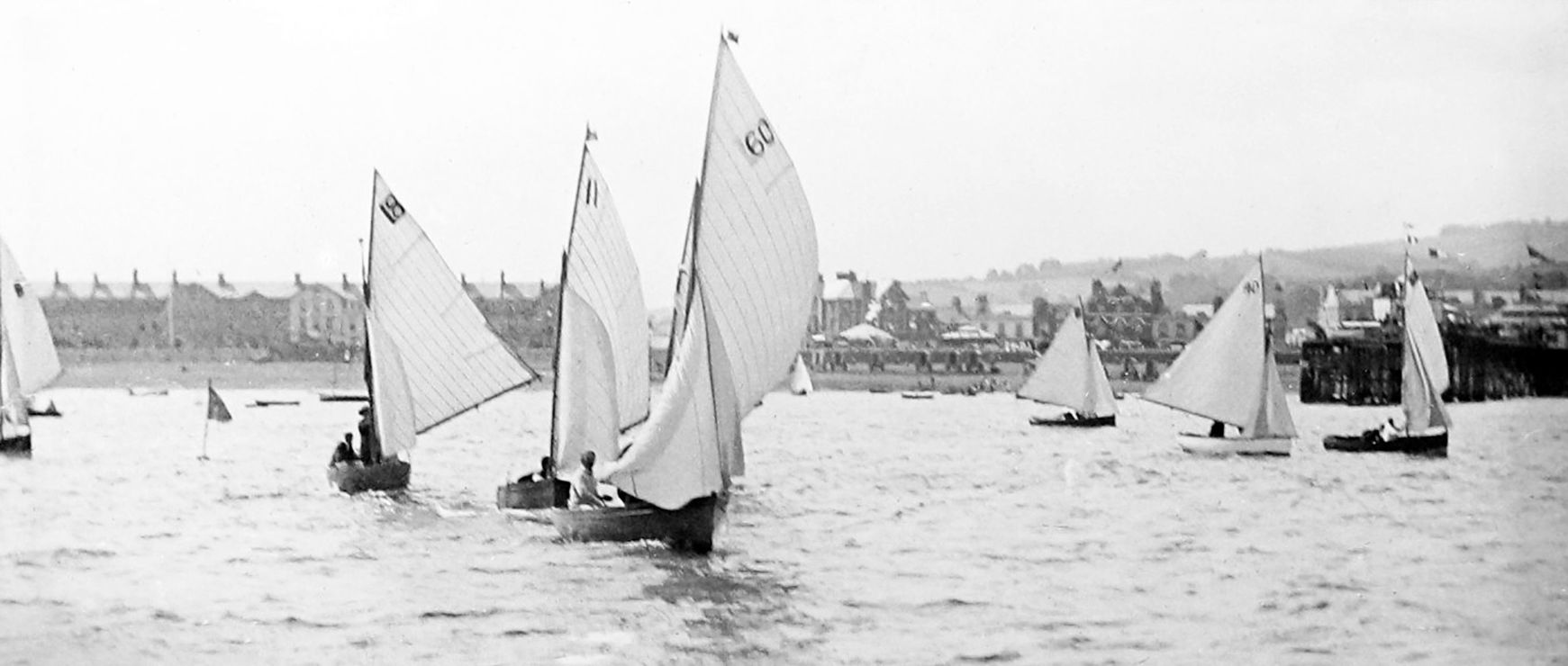 Black and white image of a dinghy race