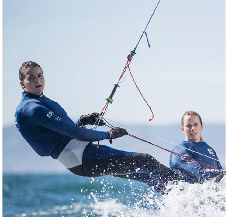 Two women sailing on the open water