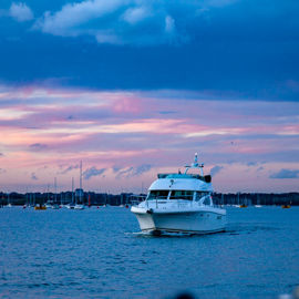 Early evening powerboat sailing as the daylight fades