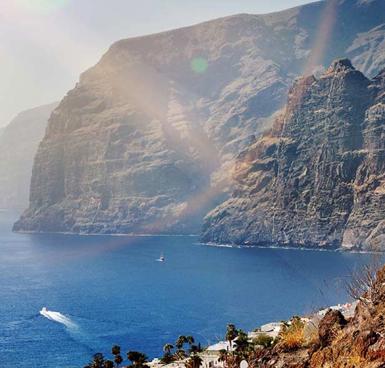 motor boat in the distance on the ocean off the coast of Tenerife