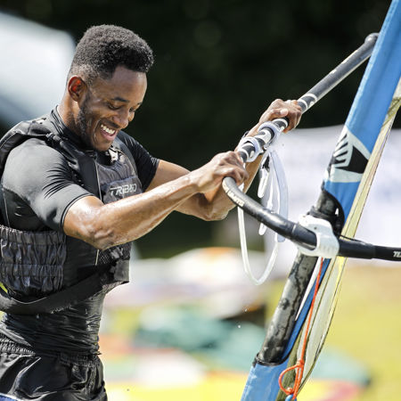 close up shot of man windsurfing