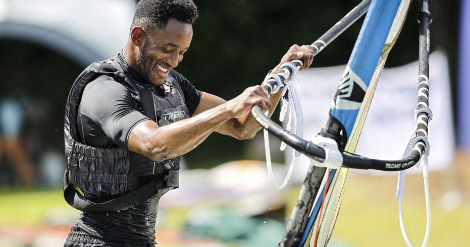 close up shot of man windsurfing